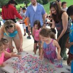 children at lolipop table