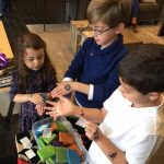 children playing with tattoos and sponge